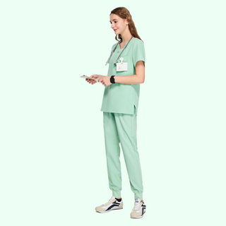 light green medical uniform for women, pants with ribbed ankle cuffs and top with v-neck